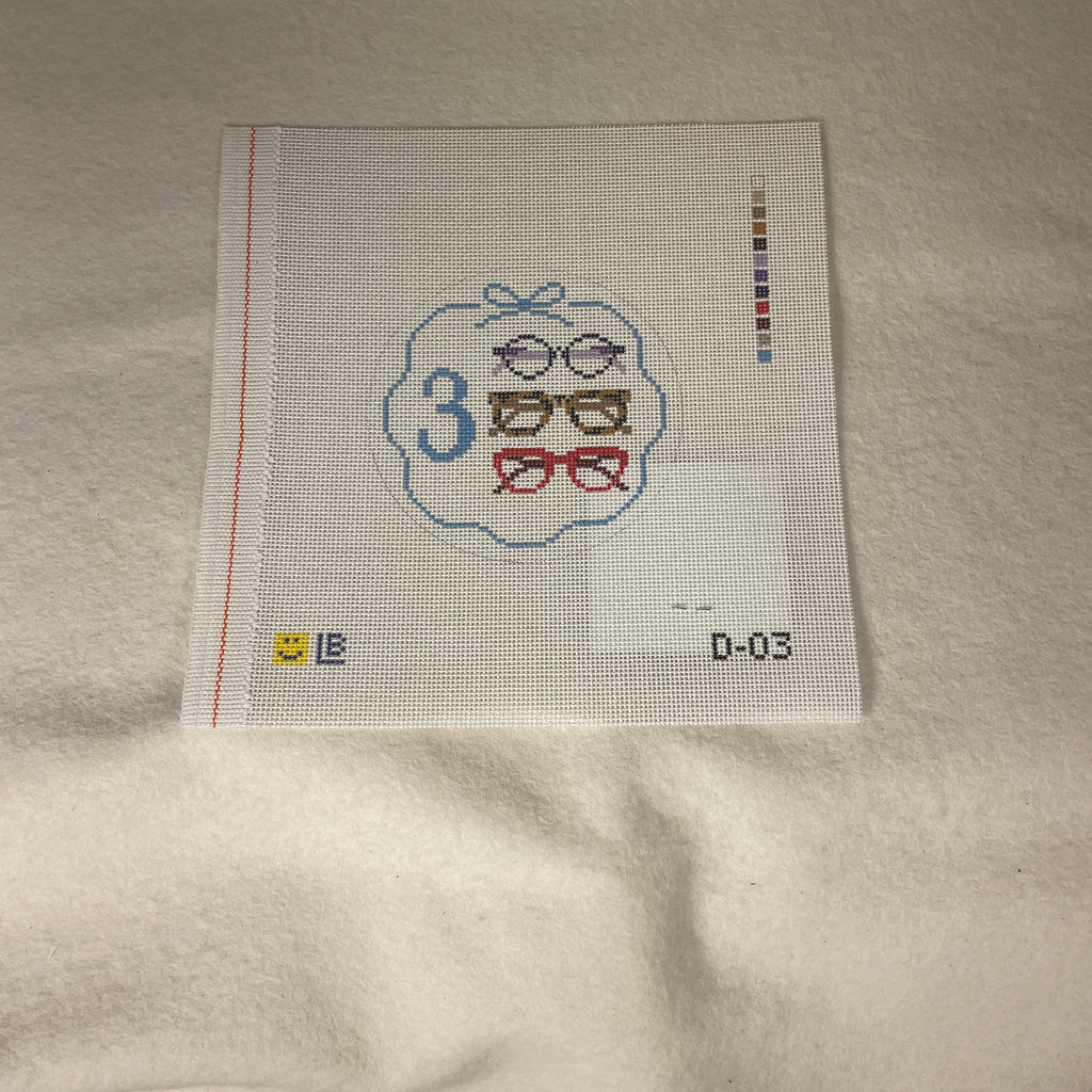 * Lauren Bloch  D03- 12 Days of Needlepoint- Three Spectacles